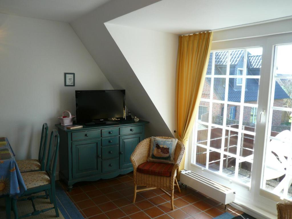 TV a/nebo společenská místnost v ubytování Kastanienhüs Apartment