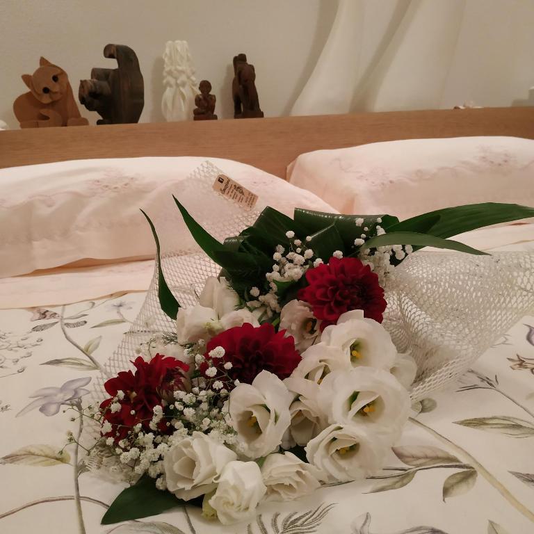 A bed or beds in a room at B&B alla Canale