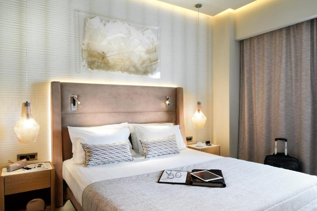 Posteľ alebo postele v izbe v ubytovaní Grand Hotel Palace