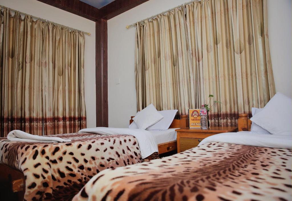 Ліжко або ліжка в номері Hotel Hakoniwa