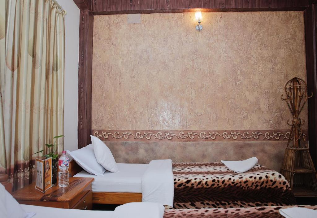 Ліжко або ліжка в номері Hotel Hakoniwa