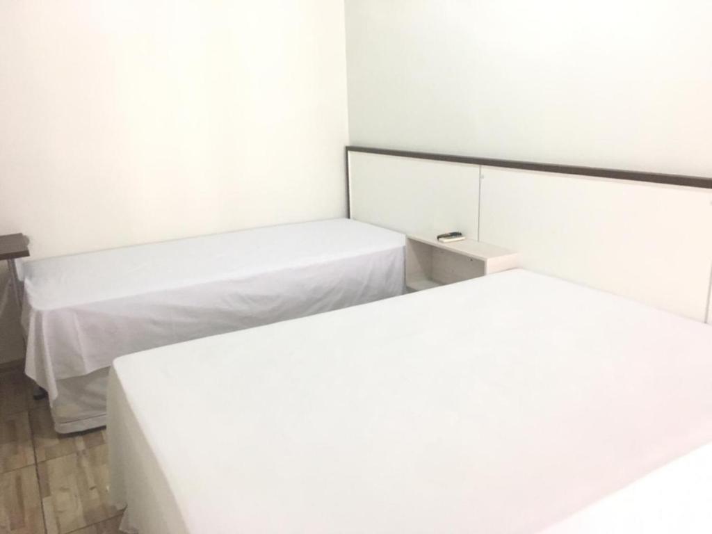 Postel nebo postele na pokoji v ubytování Hotel Rio Paraná