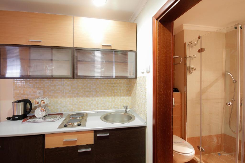Koupelna v ubytování Hotel Junior