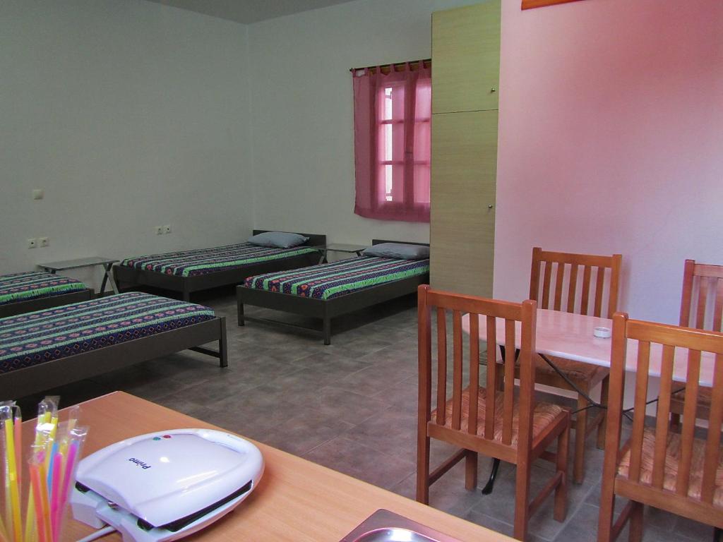 Posteľ alebo postele v izbe v ubytovaní "Action" House in Leonidio 4-beds