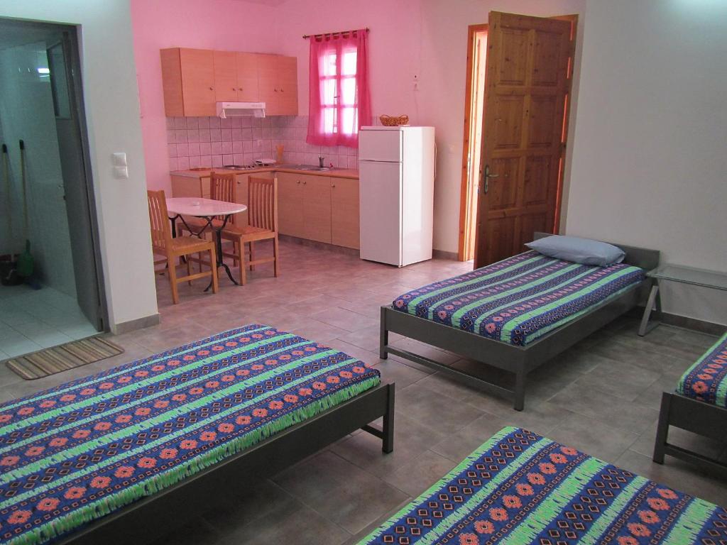 Posteľ alebo postele v izbe v ubytovaní "Action" House in Leonidio 4-beds