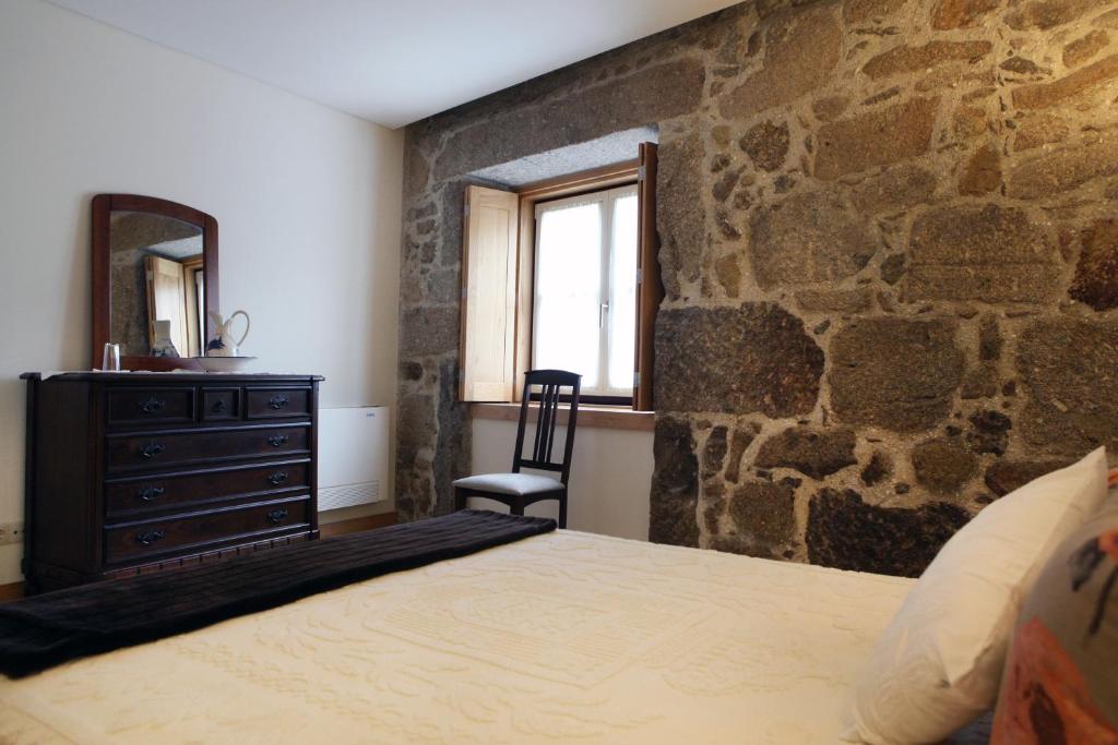 Een bed of bedden in een kamer bij Casa da Ponte do Porto
