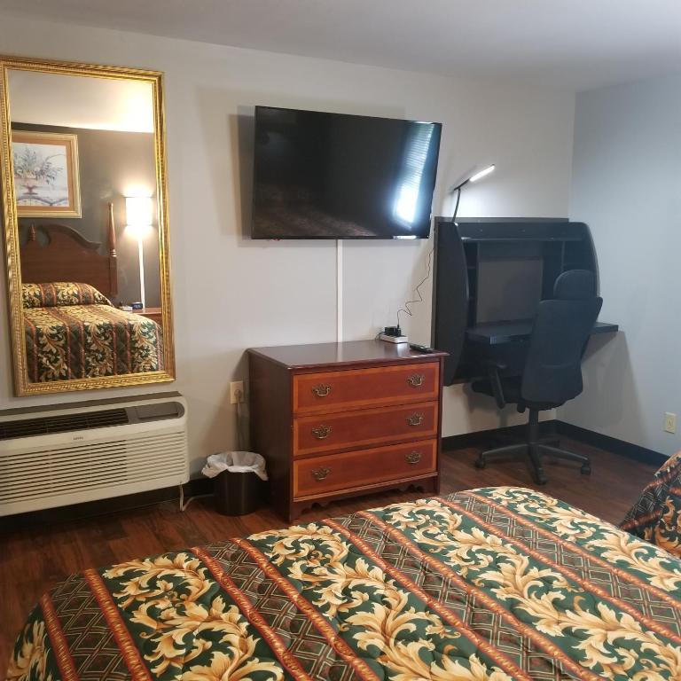 TV a/nebo společenská místnost v ubytování Cottage Inn - Grantville