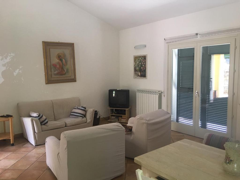 Telewizja i/lub zestaw kina domowego w obiekcie La casa di Fedra