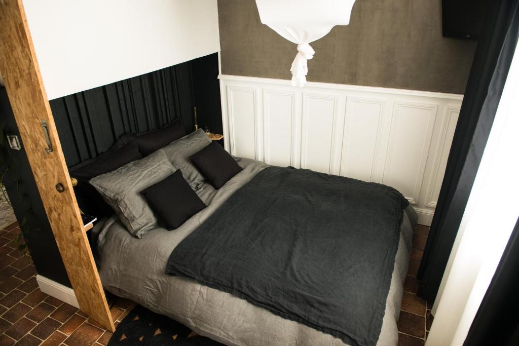 Postel nebo postele na pokoji v ubytování -LA CORDIALITÉ-