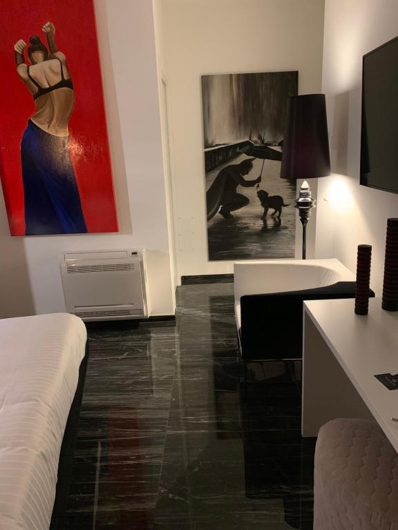 Postel nebo postele na pokoji v ubytování Voglia di Vino Locanda