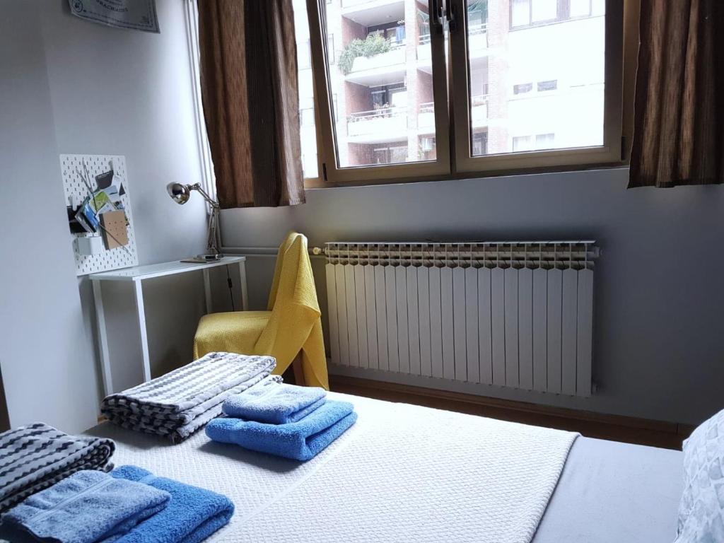Postel nebo postele na pokoji v ubytování Blue Dreams Apartment