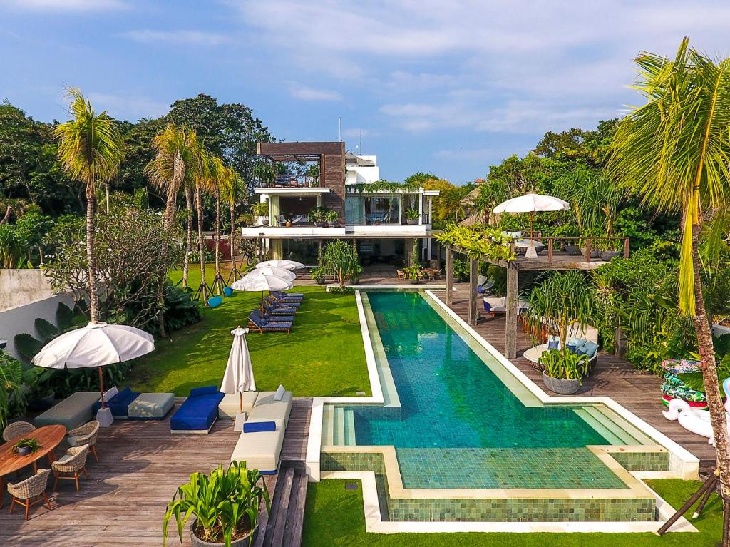 an aerial view of a resort with a swimming pool at Noku Beach House by Elite Havens in Seminyak