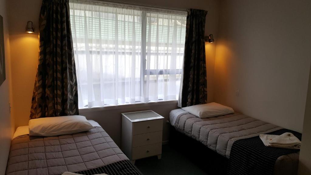 Postel nebo postele na pokoji v ubytování Aalton Motel