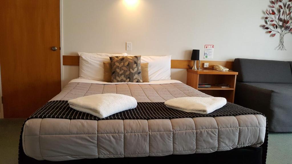 Postel nebo postele na pokoji v ubytování Aalton Motel