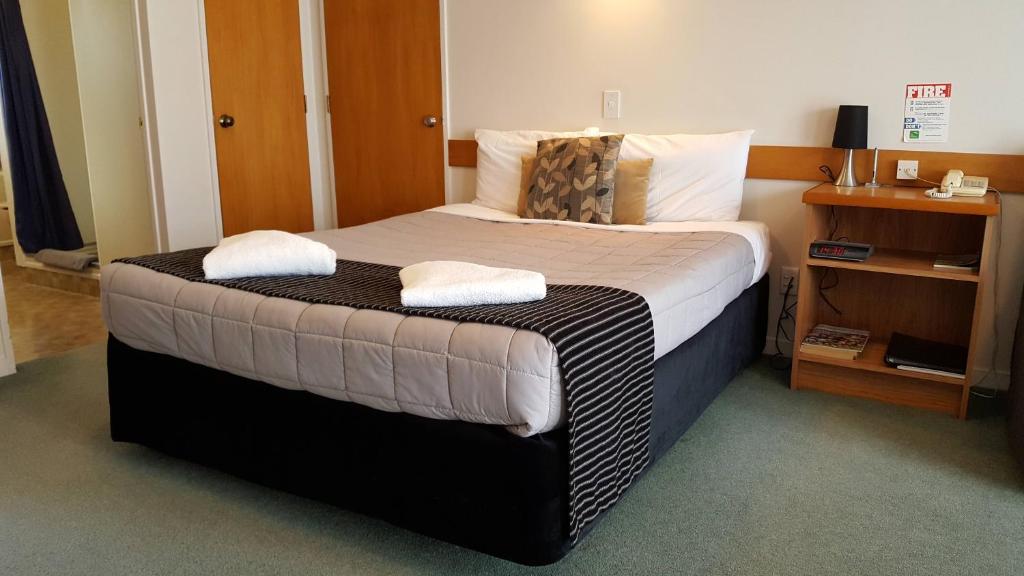 Postel nebo postele na pokoji v ubytování Aalton Motel