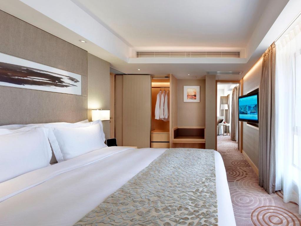 Letto o letti in una camera di The Royal Garden
