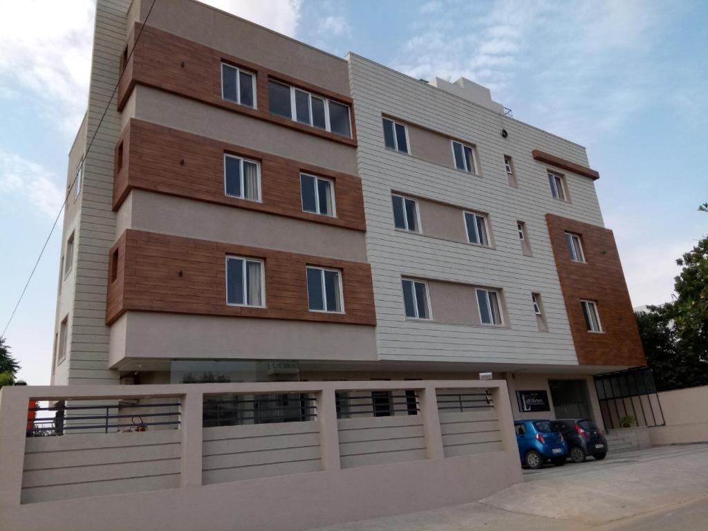 a large building with a lot of windows at Hotel The Lighthouse in Jaipur