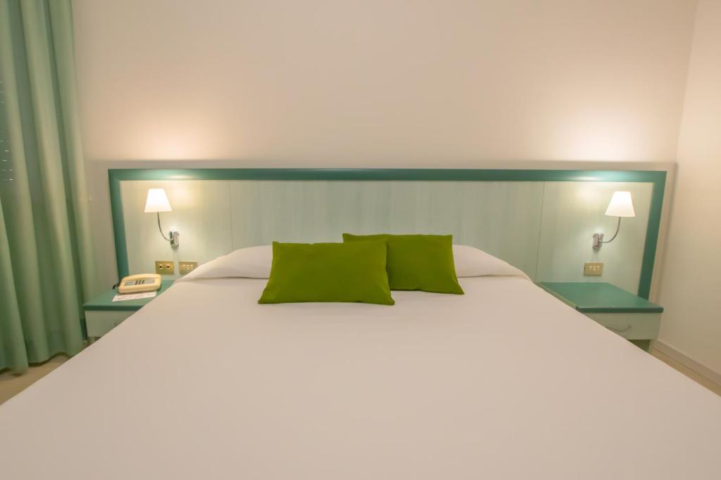 Postel nebo postele na pokoji v ubytování Hotel Europa