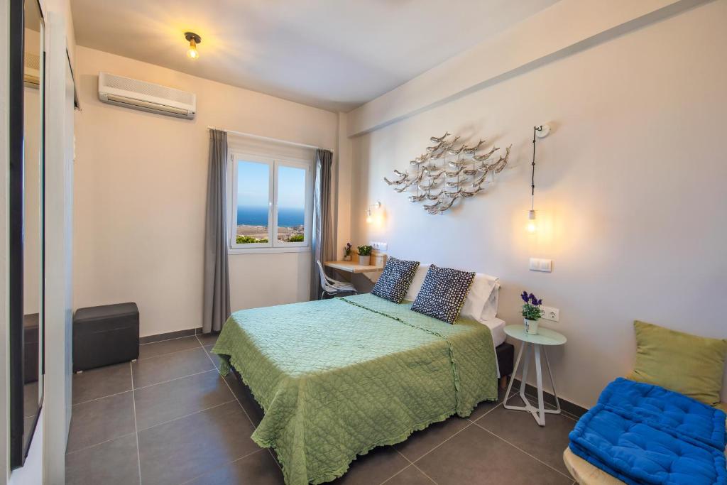 Postel nebo postele na pokoji v ubytování Afrodete Hotel