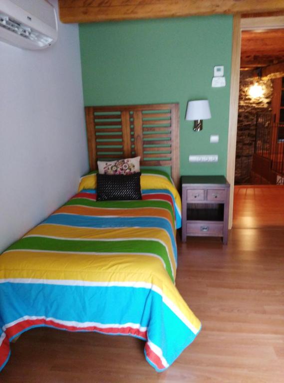 Postel nebo postele na pokoji v ubytování Masia d'en Valentí