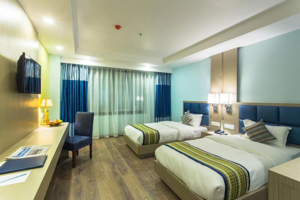Postel nebo postele na pokoji v ubytování Hotel Siddhartha, Nepalgunj