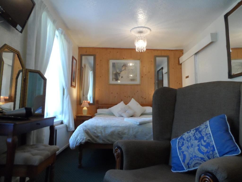 Postel nebo postele na pokoji v ubytování St Martins Guest House