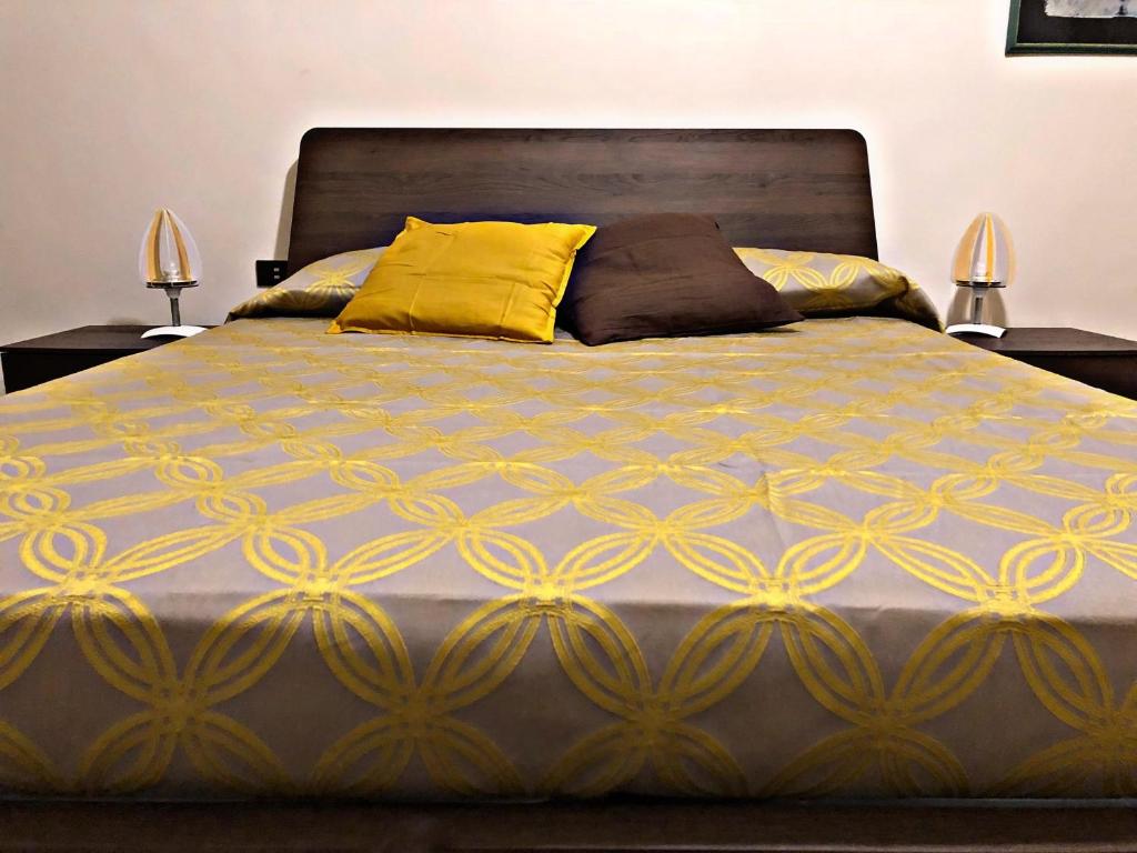 Posteľ alebo postele v izbe v ubytovaní Napoli City Inn