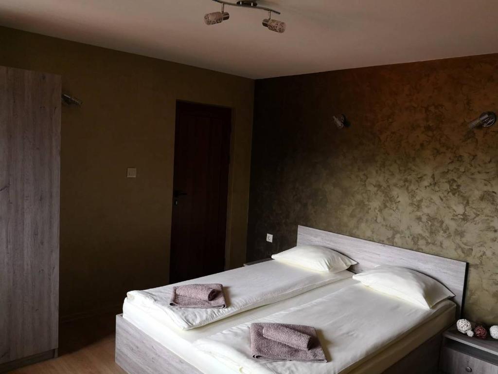 Postel nebo postele na pokoji v ubytování Yurukovata kashta