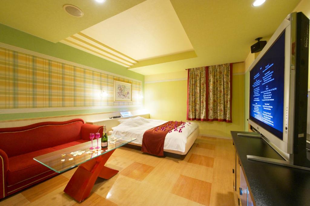 TV a/nebo společenská místnost v ubytování Hotel Park Inn (Adult Only)