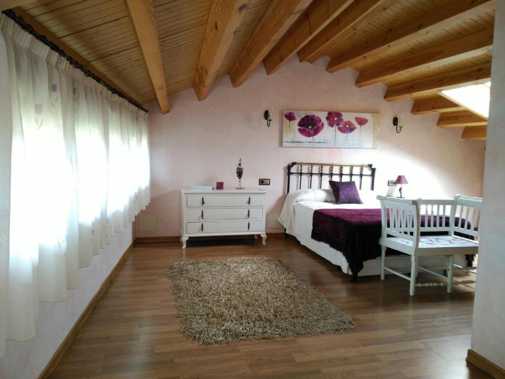 Postel nebo postele na pokoji v ubytování Casa rural Lucia