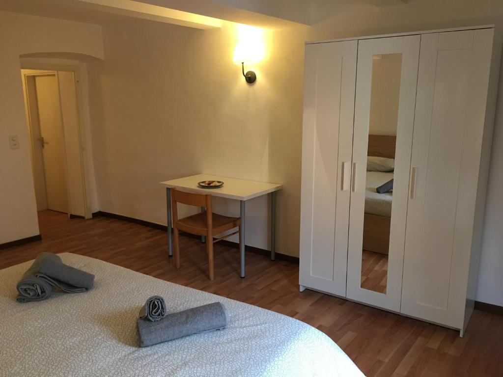 Postel nebo postele na pokoji v ubytování Albergo Ristorante Belcantone