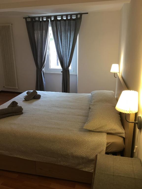 Postel nebo postele na pokoji v ubytování Albergo Ristorante Belcantone