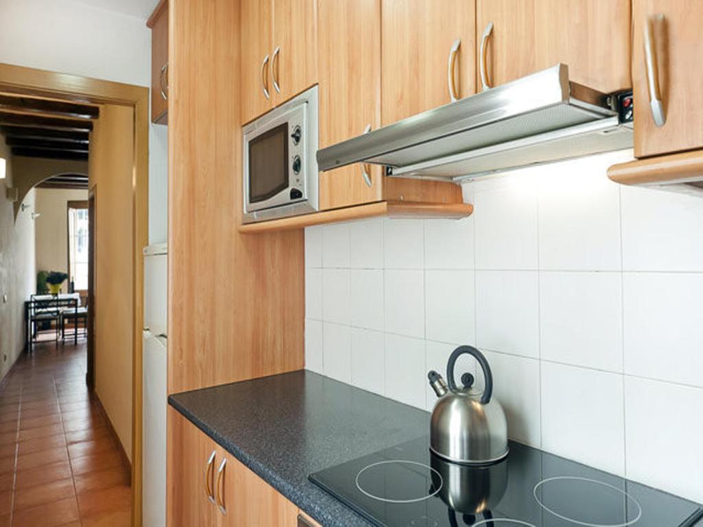 Kuchyň nebo kuchyňský kout v ubytování Top Barcelona Apartments