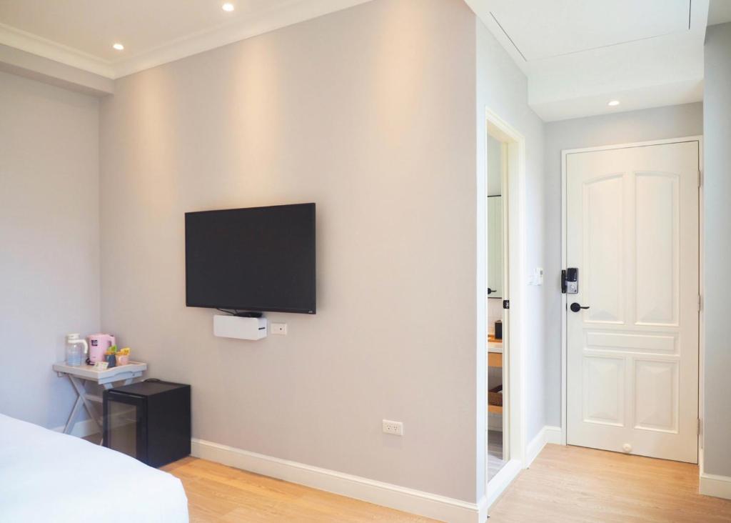TV a/nebo společenská místnost v ubytování Notting Leaf B&B
