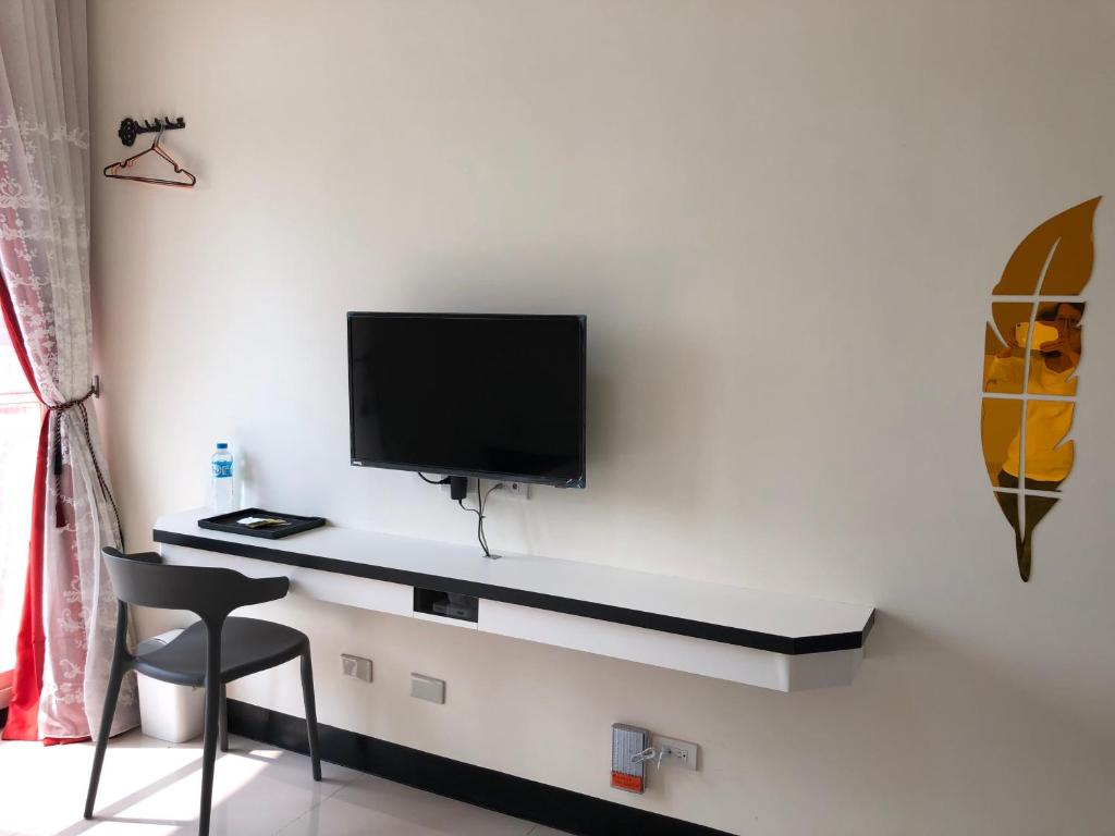 TV a/nebo společenská místnost v ubytování Country House Homestay