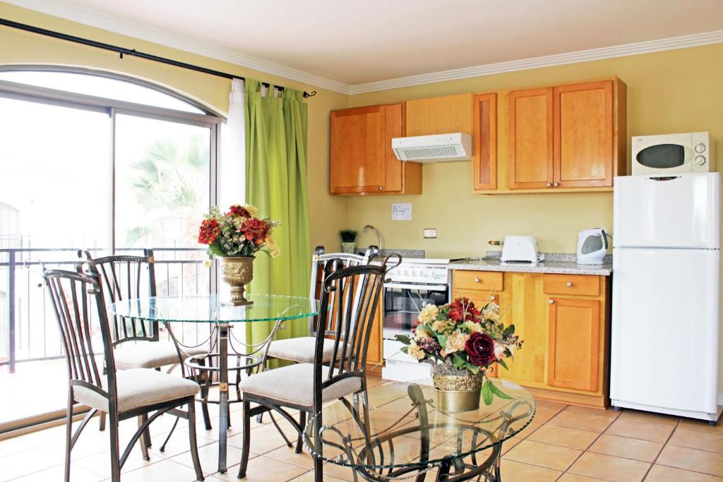 Kuchyň nebo kuchyňský kout v ubytování Aparthotel Serena Dream