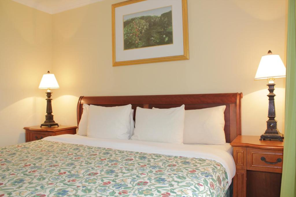 Postel nebo postele na pokoji v ubytování Aparthotel Serena Dream