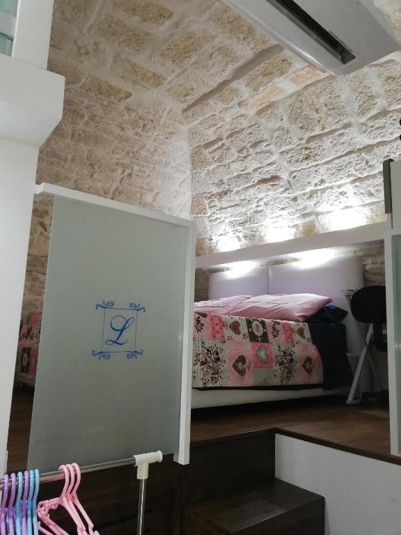 Łóżko lub łóżka w pokoju w obiekcie Lilla B&B