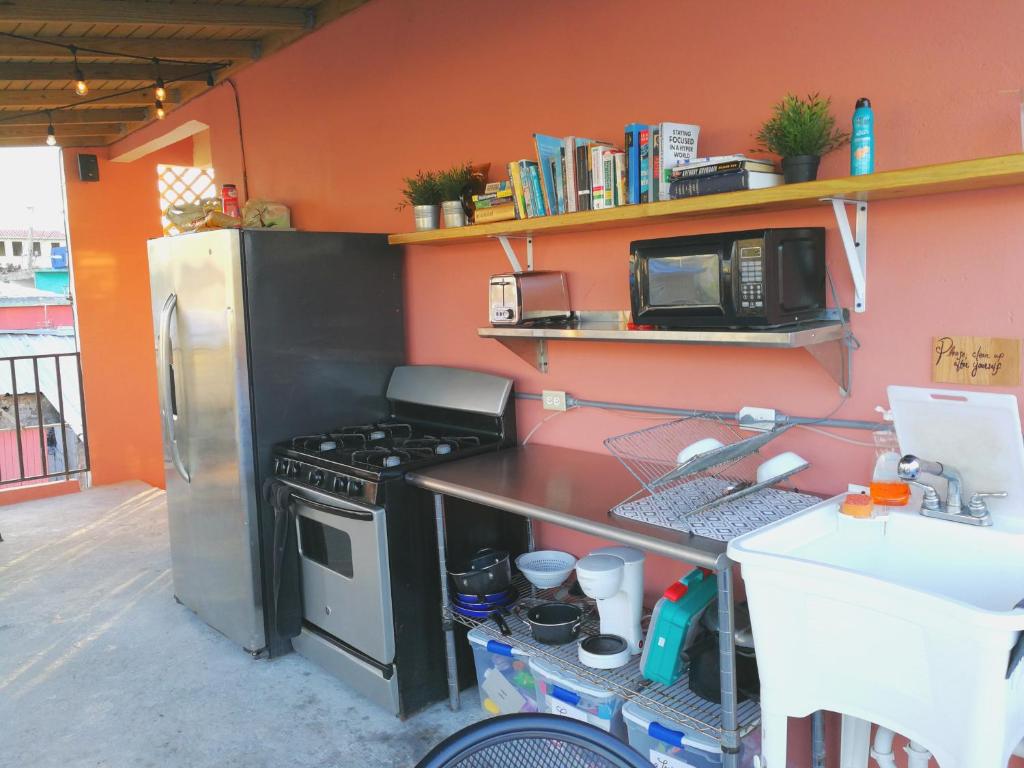 Kuchyň nebo kuchyňský kout v ubytování Casa Santurce