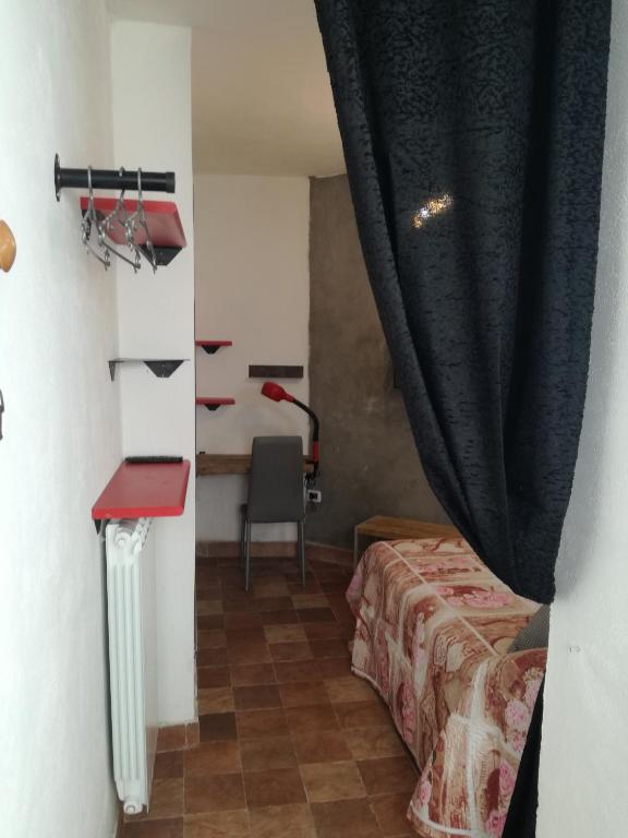 Łóżko lub łóżka w pokoju w obiekcie B&B PompeiLog