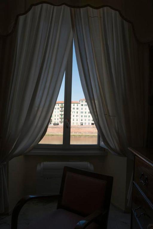 Fotografia z galérie ubytovania Luxory suite su Lungarno v destinácii Pisa