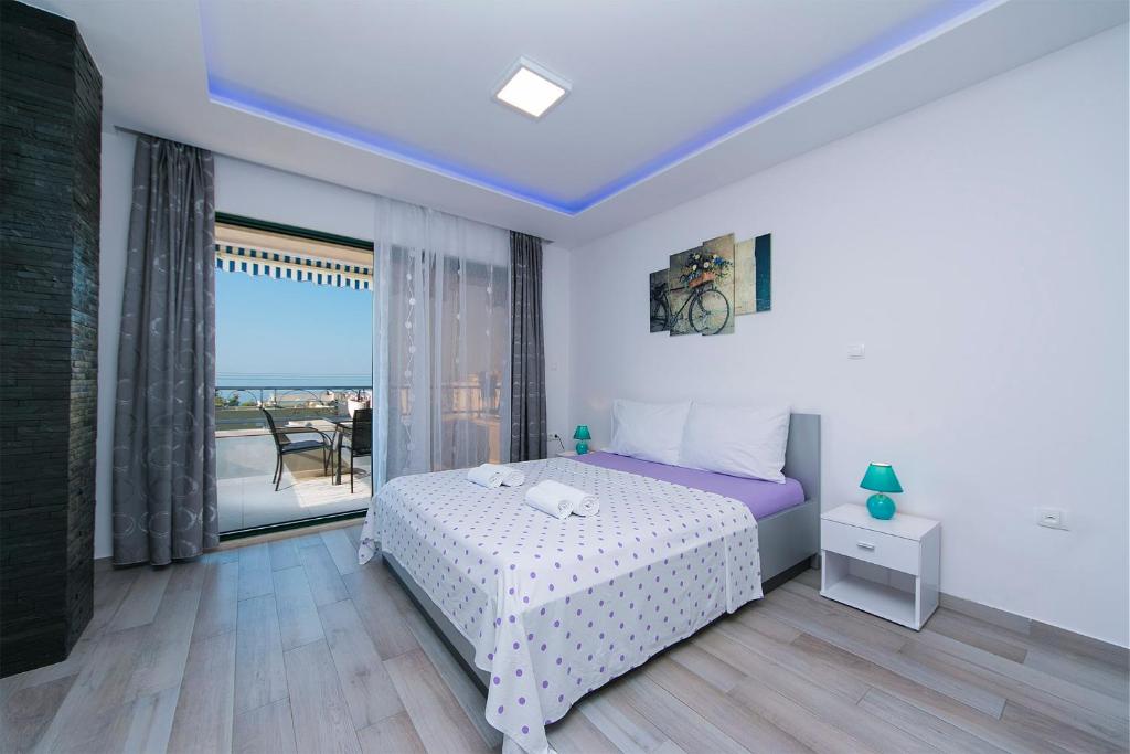 Posteľ alebo postele v izbe v ubytovaní Apartment Roso