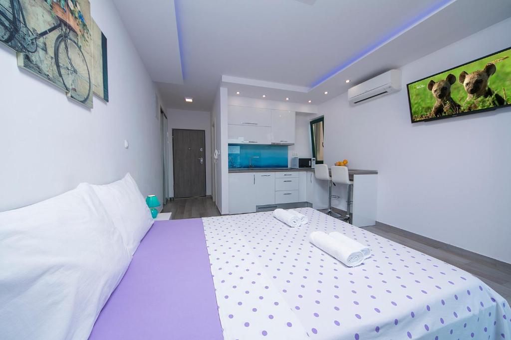 Posteľ alebo postele v izbe v ubytovaní Apartment Roso