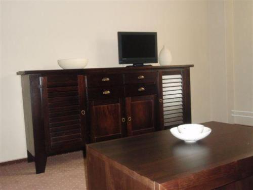TV a/nebo společenská místnost v ubytování Hotel Galileo