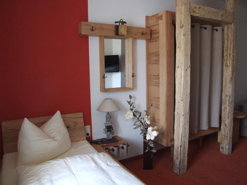 Postel nebo postele na pokoji v ubytování Hotel Goldener Stern