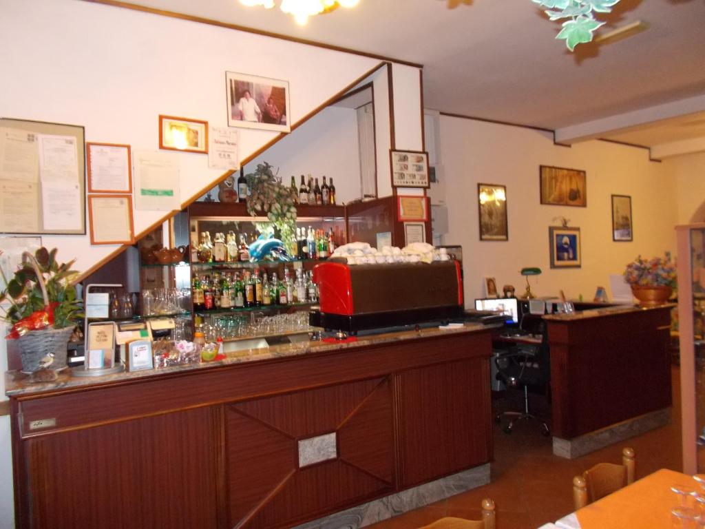 The lounge or bar area at Pensione Delfino Azzurro