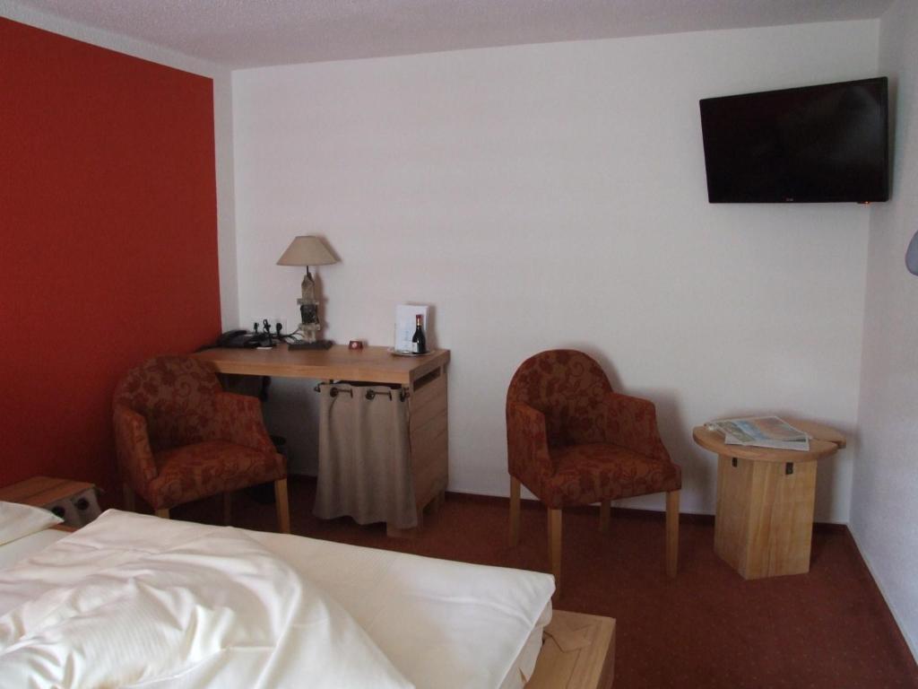 TV a/nebo společenská místnost v ubytování Hotel Goldener Stern
