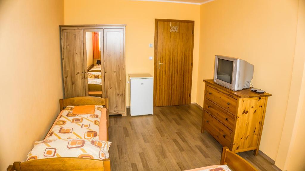 Postel nebo postele na pokoji v ubytování Penzion s restaurací na Furhaple