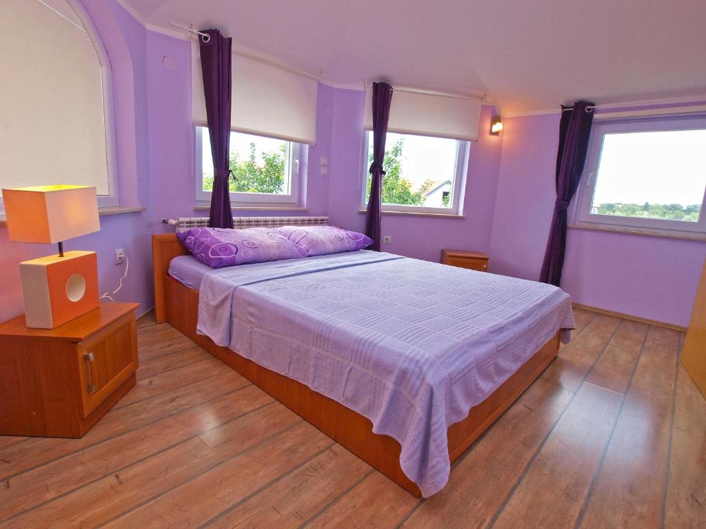Postel nebo postele na pokoji v ubytování Apartments Fazanka 1002