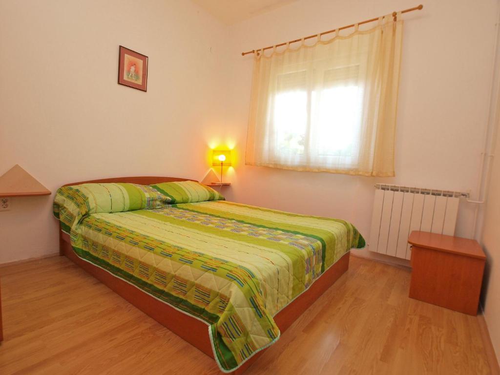Postel nebo postele na pokoji v ubytování Apartments Fazanka 1002